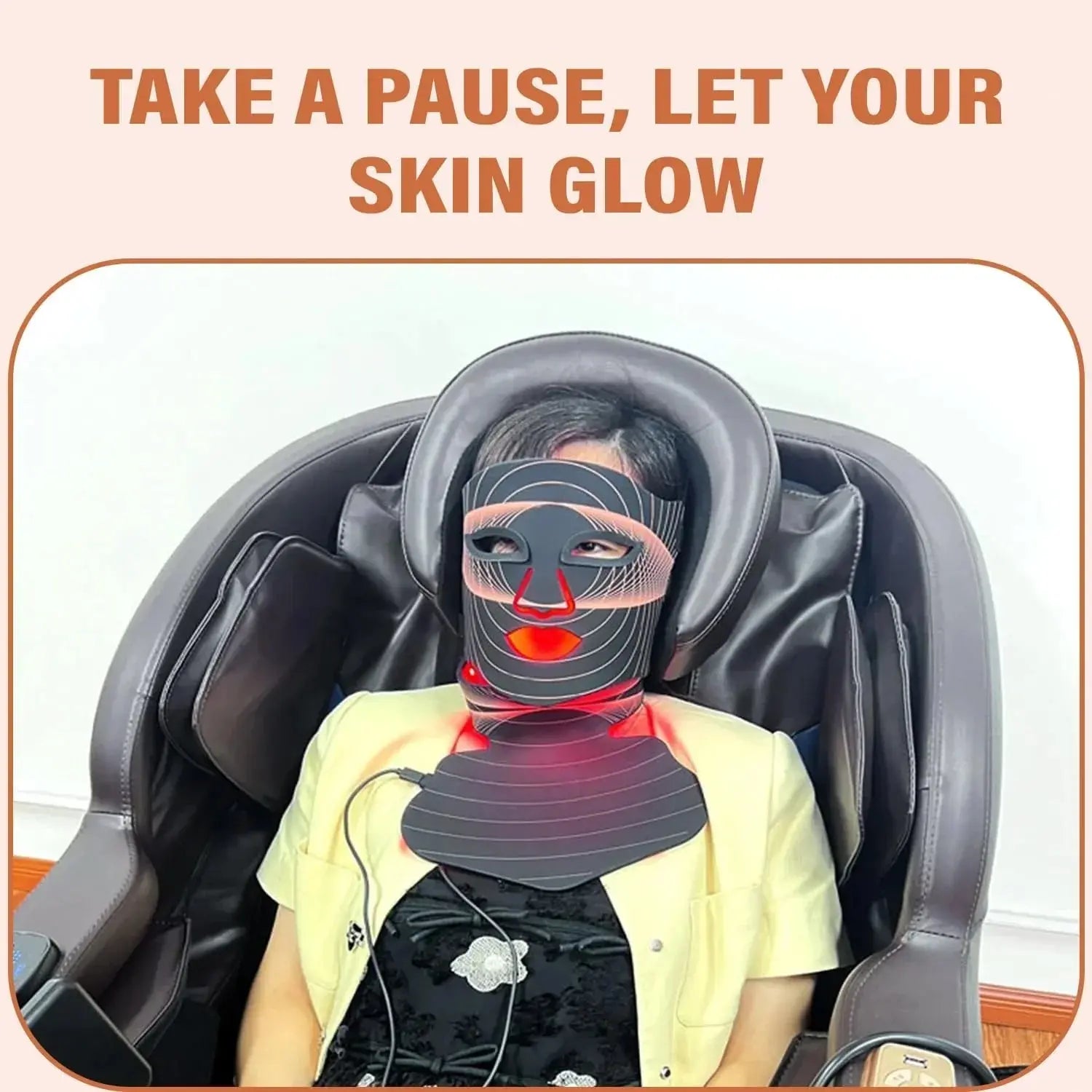 Woman relaxing in massage chair wearing LED light therapy face and neck mask for skincare
