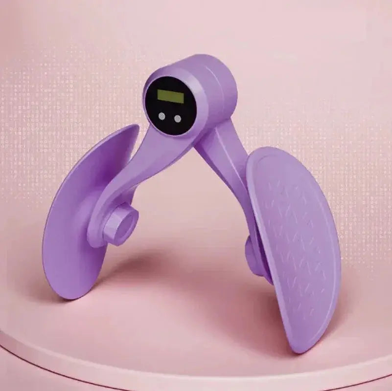 Purple fitness thigh trainer with LCD display on a pink background