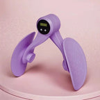 Purple thigh exerciser with digital counter on soft pink background, fitness equipment